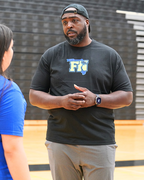 Coach Carlyle 'SLIM' Lewis