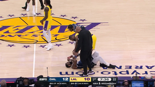 Kyrie exits to the locker room after this tackle by LeBron