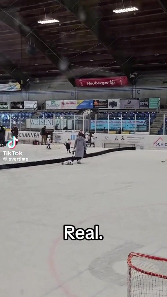 Mom dragging son off ice during hockey practice