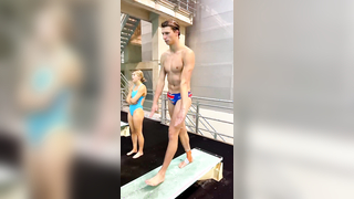 Mesmerizing Slow-Motion Dive: British Diver's Flawless Indoor Springboard Performance
