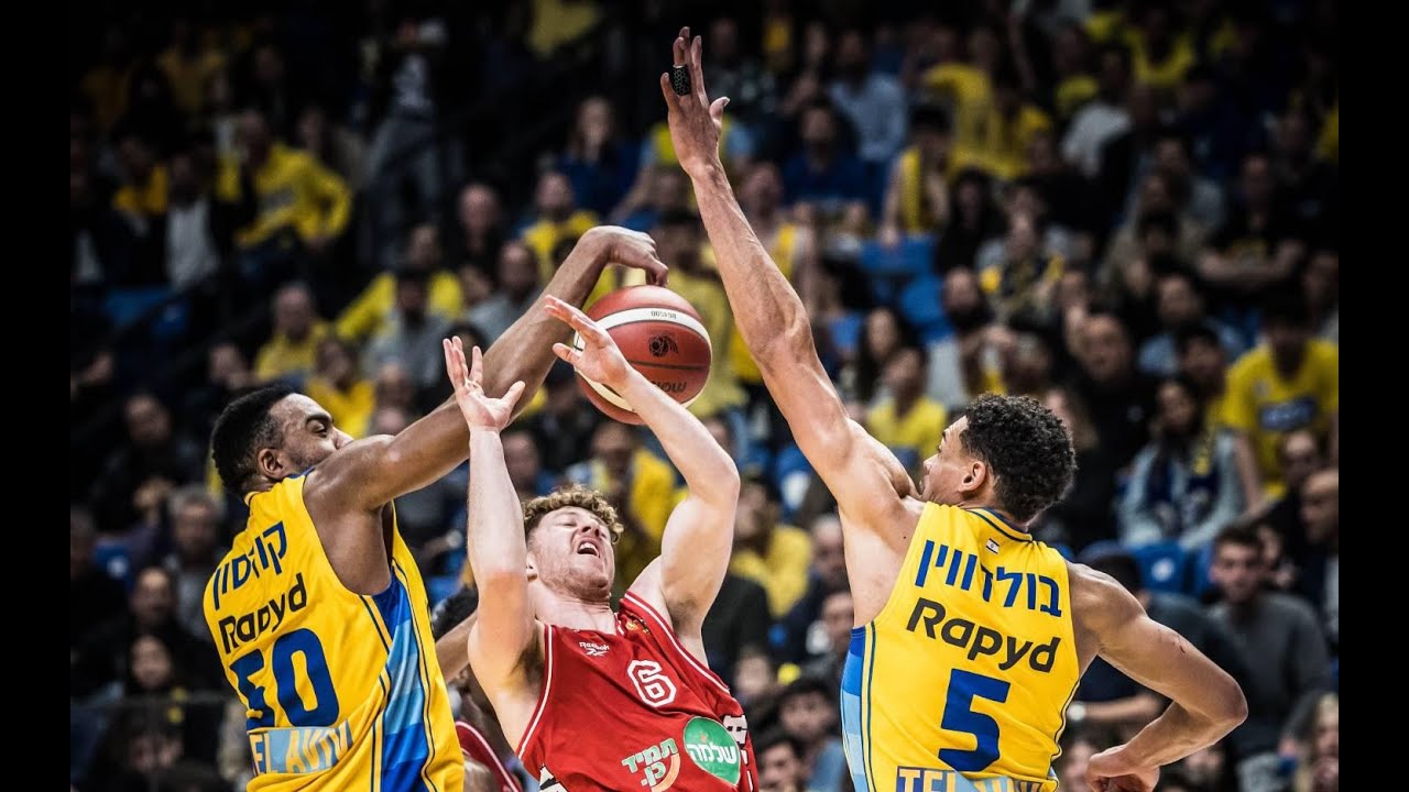 Built like a fortress: Maccabi's champion roof party in the derby.