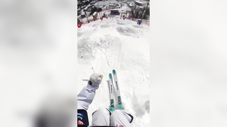 POV: Experience the Thrill of a Mogul Skier's Perfect Backflip!
