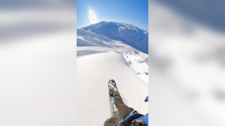 Travis Rice's Insane Backcountry Drop: Snowboarding at Its Most Extreme!