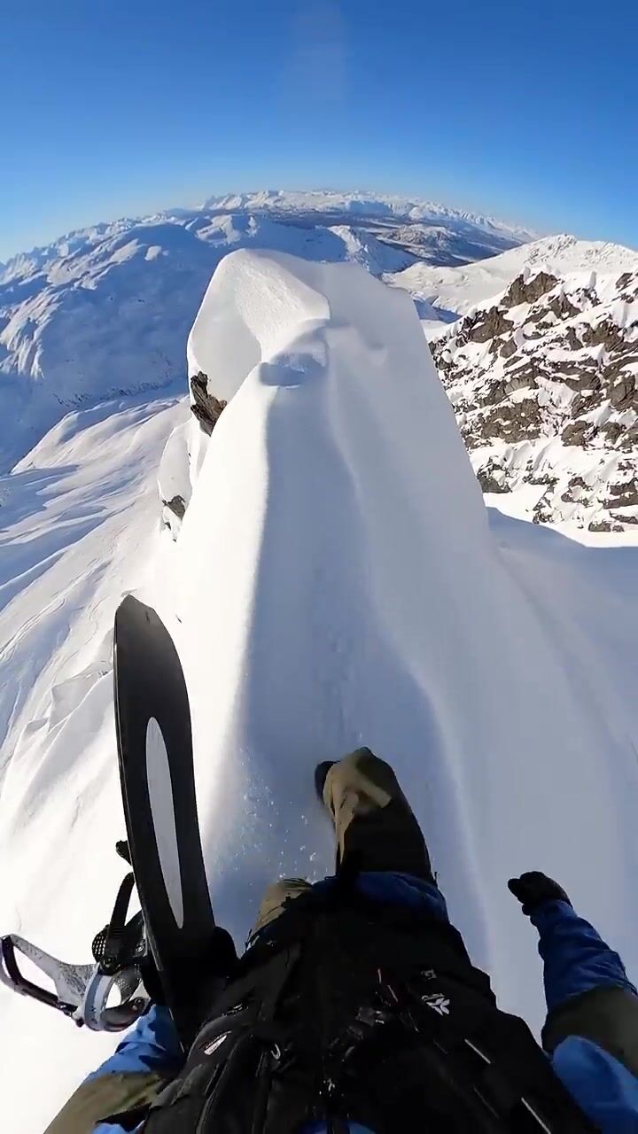 Travis Rice's Insane Backcountry Drop: Snowboarding at Its Most Extreme!