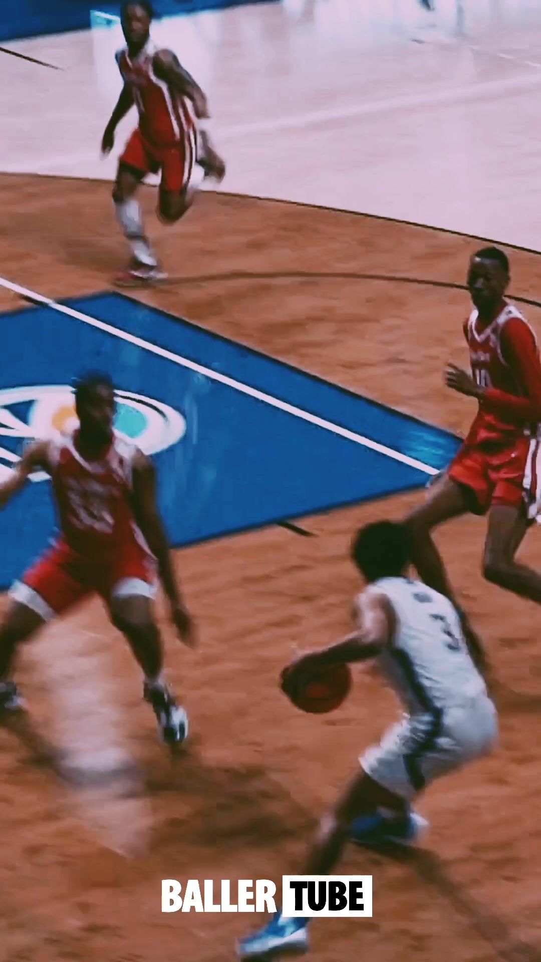 Fluid Ball Movement: Joe Moon IV's Smooth Three-pointer Assisted by Dominick Denny