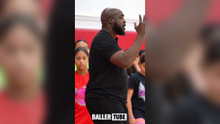 Coach Slim Leads Campers Through Dynamic Warmup Stretch at the Elite 60 Showcase