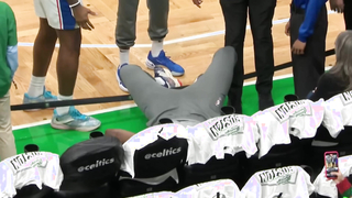 Joel Embiid Rolls Ankle on Security and Crashes into Front Row During Pregame Warmups