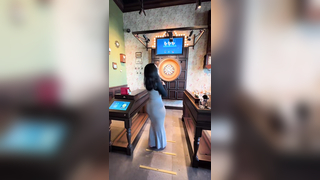 Just a girl playing darts