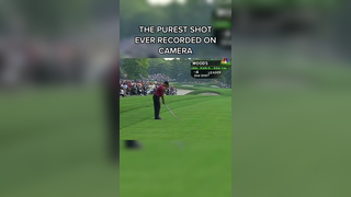 Tiger Woods roasting his approach shot into the 13th green at the 200...
