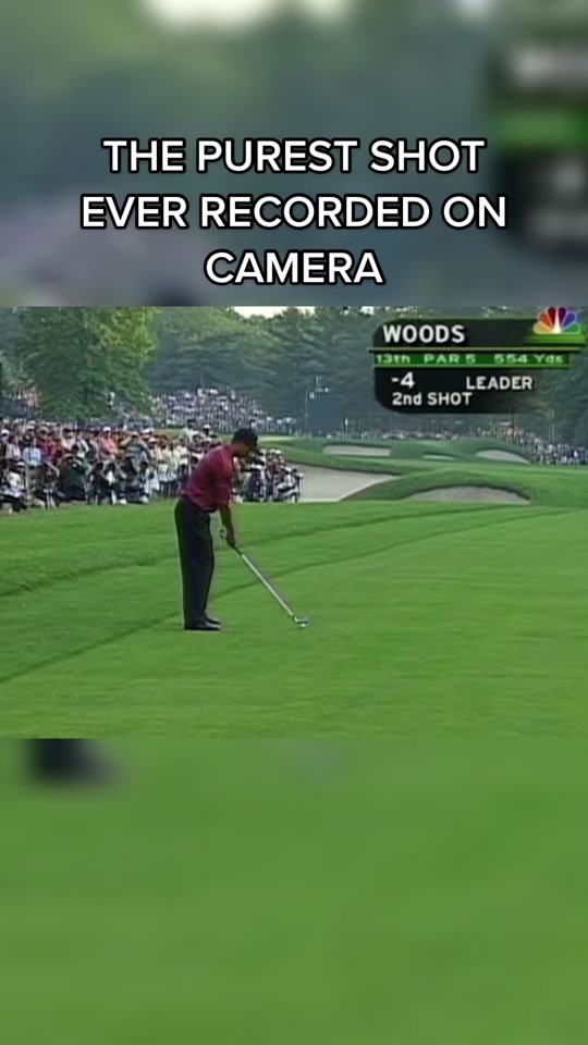 Tiger Woods roasting his approach shot into the 13th green at the 200...