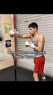 What is the name of the man in the grey shirt? #boxing