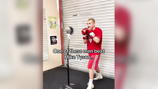 What is the name of the man in the grey shirt? #boxing