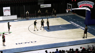 Coach Jerrod Calhoun breaks down how to manipulate the low man in the 5-Out system.