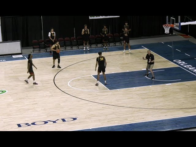 Coach Jerrod Calhoun breaks down how to manipulate the low man in the 5-Out system.